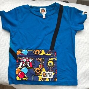 Bape Kids Blue Tee with Colorful Carnival Pocket Print